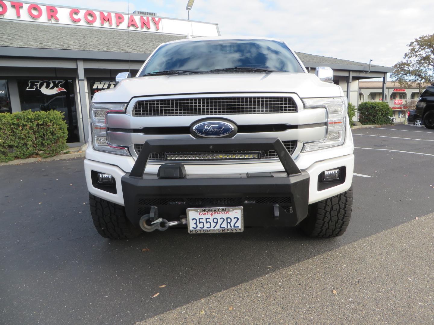 2019 White /BLACK INT W/DARK MARSALA LT Ford F-150 Platinum SuperCrew Cab 4WD (1FTEW1E45KF) with an 3.5L V6 ECOBOOST engine, 10-SPEED AUTO W/TOW MO transmission, located at 2630 Grass Valley Highway, Auburn, CA, 95603, (530) 508-5100, 38.937893, -121.095482 - F150 Platinum featuring a level kit, Fuel Offroad wheels, Toyo AT2 tires, Barricade Front winch bumper, Smittybilt winch, LED light bar, Undercover Ultraflex bedcover, and a Cargo Glide bed system. - Photo#1